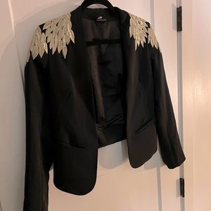 Black suit jacket with gold leaf embellishment